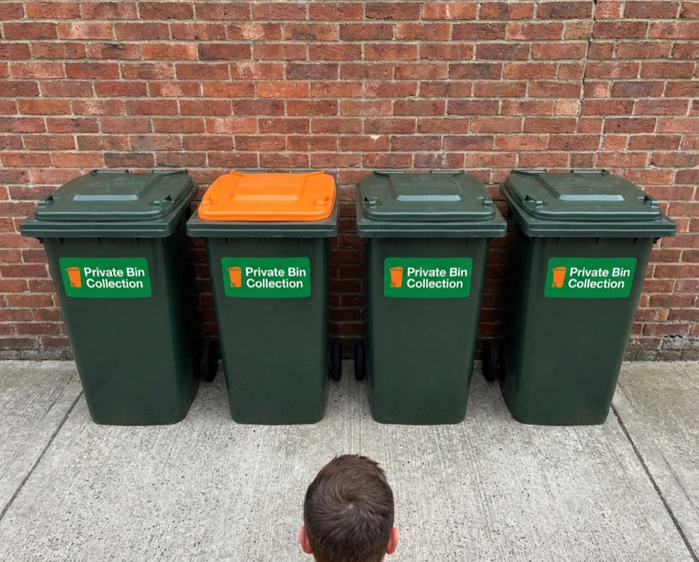 Neatly arranged bins after private collection in Goring-by-Sea